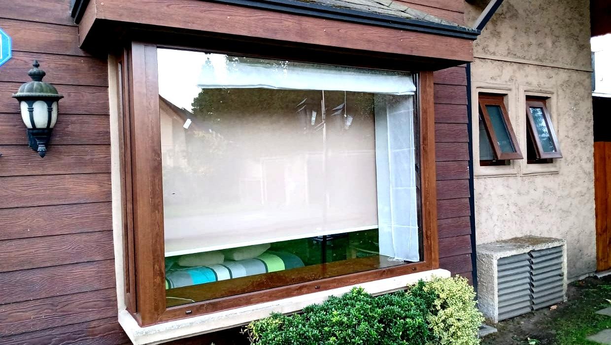 Bow Window con ventanas de abatir