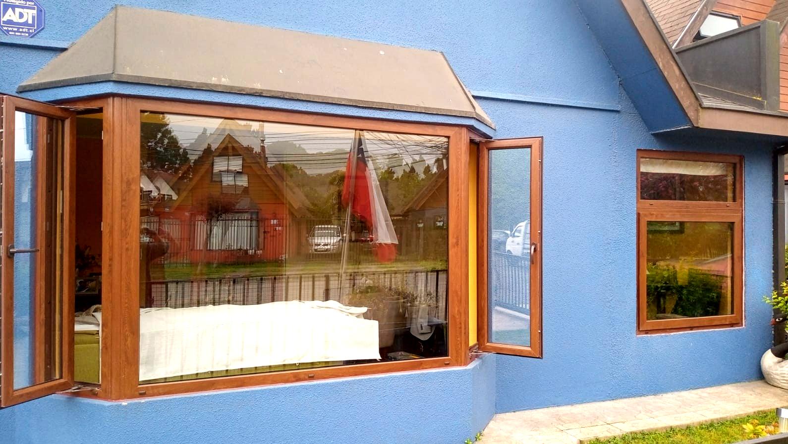 Bow Window con ventanas de abatir
